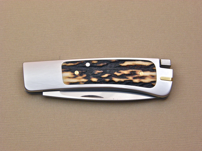 Custom Folding-Inter-Frame, Tail Lock, ATS-34 Steel, Amber Stag Knife made by Ron Lake