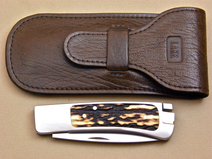 Custom Folding-Inter-Frame, Tail Lock, ATS-34 Steel, Amber Stag Knife made by Ron Lake