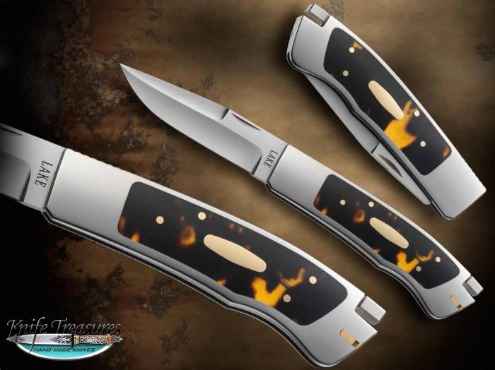 Custom Folding-Inter-Frame, Tail Lock, Un-etched Damascus, Antique Amber Knife made by Ron Lake