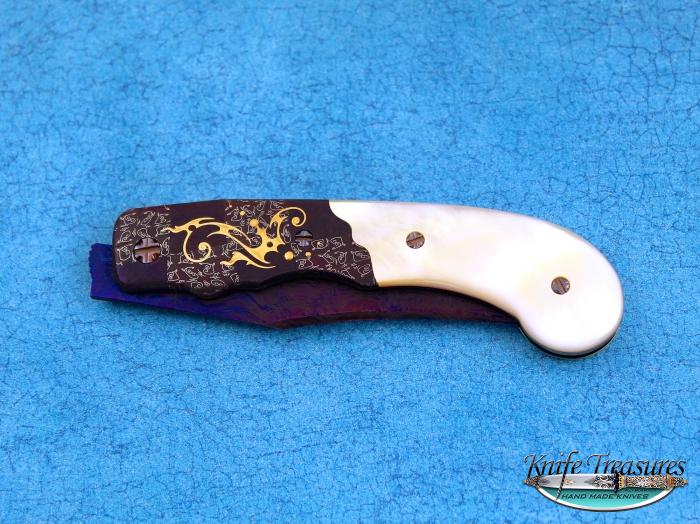 Custom Folding-Bolster, Liner Lock, Blued Damascus, Gold Lip Pearl Knife made by Rick Eaton
