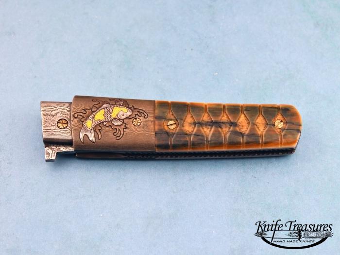 Custom Folding-Bolster, Liner Lock, Mosaic Damascus by Maker, Carved Fossilized Mammoth Knife made by Tom Ferry