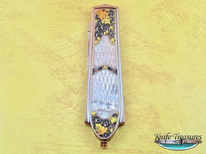 Custom Folding-Inter-Frame, Lock Back, ATS-34 Stainless Steel, Piqued Mother Of Pearl With Gold Pins Knife made by Salvatore Puddu