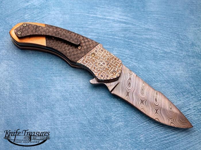 Custom Folding-Bolster, Liner Lock, Twist Pattern Damascus, Lighting Strike Carbon Fiber Knife made by Patrick Famin