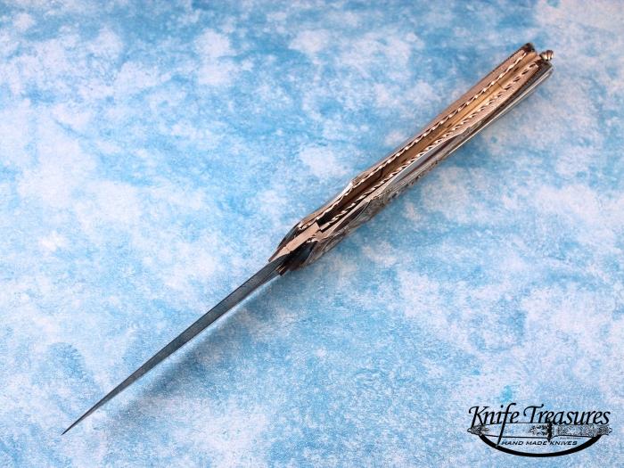 Custom Folding-Inter-Frame, Liner Lock, Raindrop Pattern Damascus, 416 Stainless Steel Knife made by Matthew Lerch