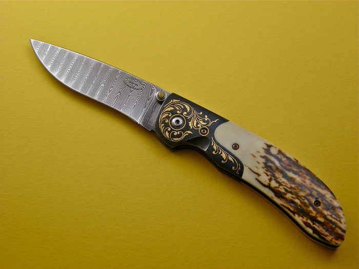 Custom Folding-Bolster, Liner Lock, Mike Norris Ladder Pattern Damascus Steel, Mammoth Ivory Knife made by Johnny  Stout