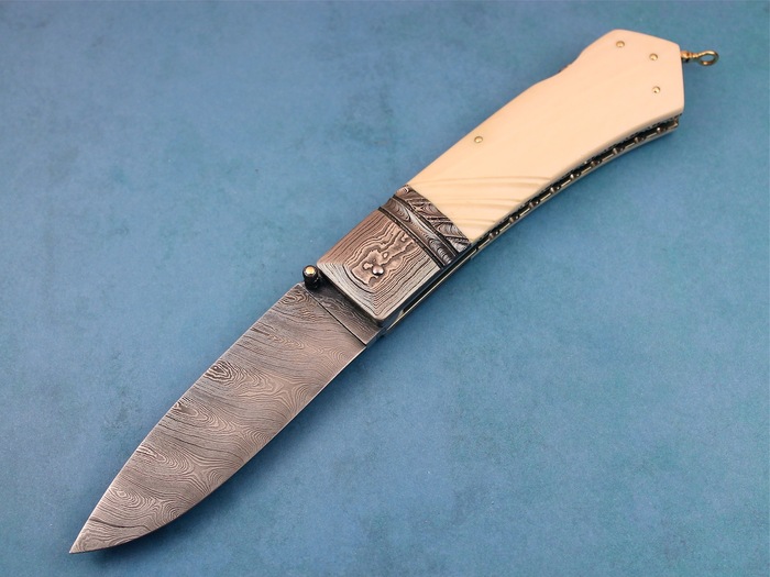 Custom Folding-Bolster, Lock Back, Damascus Steel by Maker, Fluted Fosilized Mammoth Knife made by Barry Davis