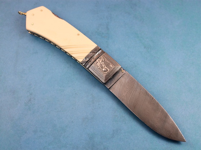 Custom Folding-Bolster, Lock Back, Damascus Steel by Maker, Fluted Fosilized Mammoth Knife made by Barry Davis