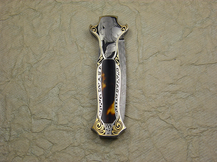 Custom Folding-Inter-Frame, Lock Back, Jerry Rados Turkish Twist Damascus, Exotic Scales Knife made by Joe Kious