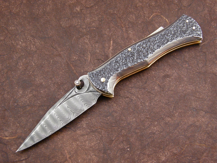 Custom Folding-Inter-Frame, Lock Back, Damascus Steel, Wagon Wheel Steel Knife made by Larry Fuegen