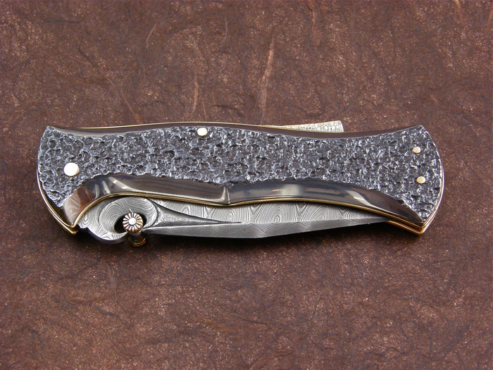 Custom Folding-Inter-Frame, Lock Back, Damascus Steel, Wagon Wheel Steel Knife made by Larry Fuegen