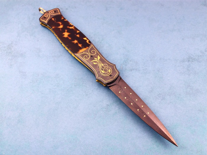 Custom Folding-Bolster, Liner Lock, Rob Thomas Raindrop Damascus, Exotic Scales Knife made by Larry Newton